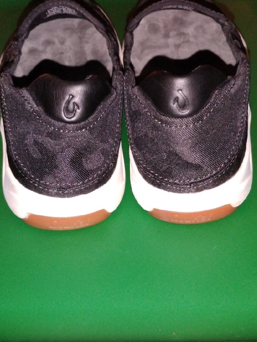 OluKai Men’s Black Camo Slip-On Sneakers with White Midsole - Picture 4 of 6
